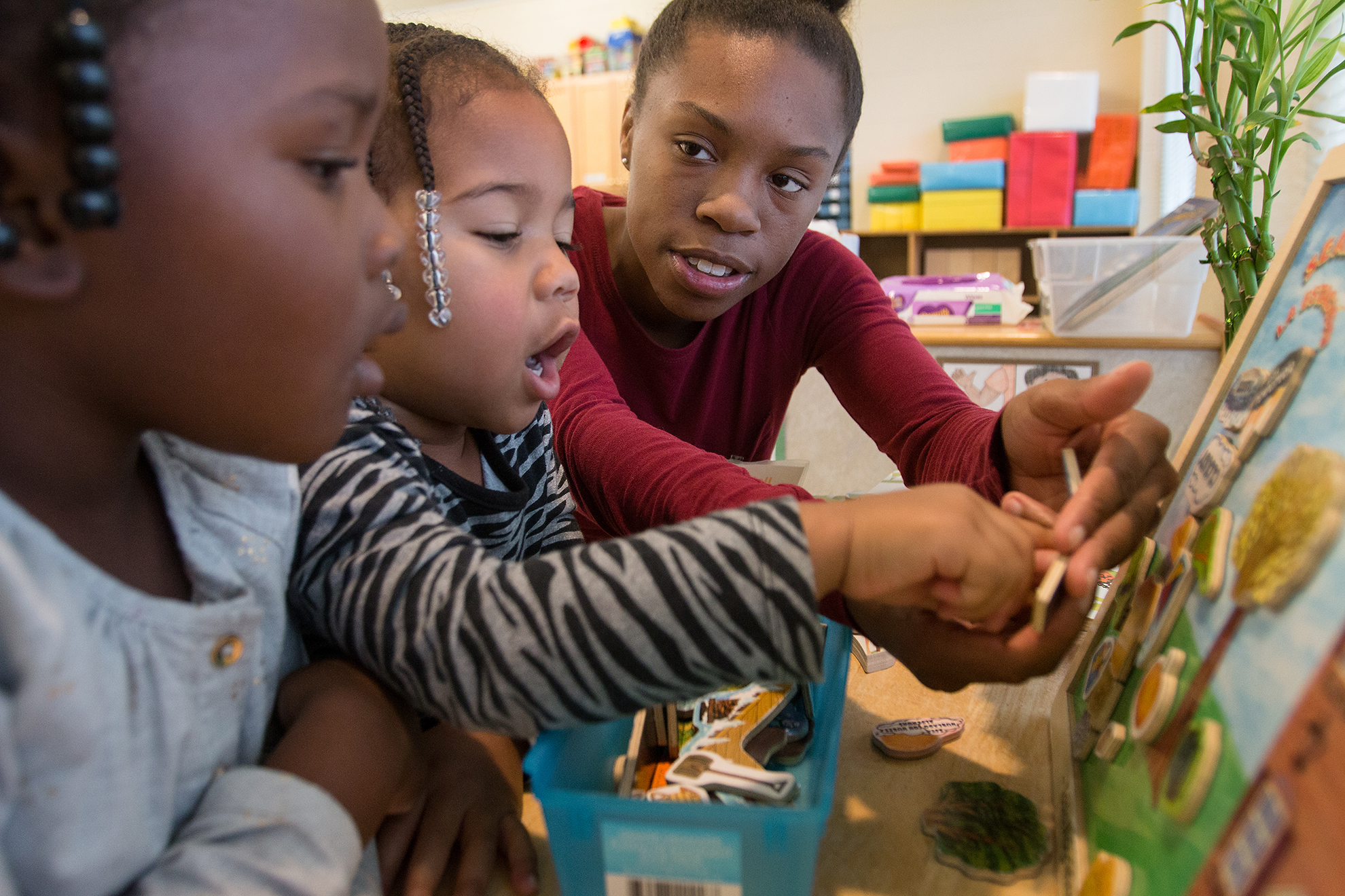 child development student working with children