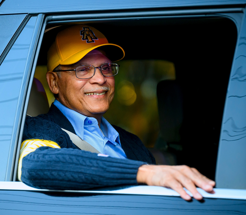 Dr. Harold L. Martin, Sr. in car at homecoming parade