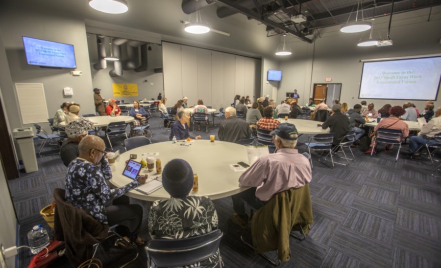 A group of people sitting around a table.