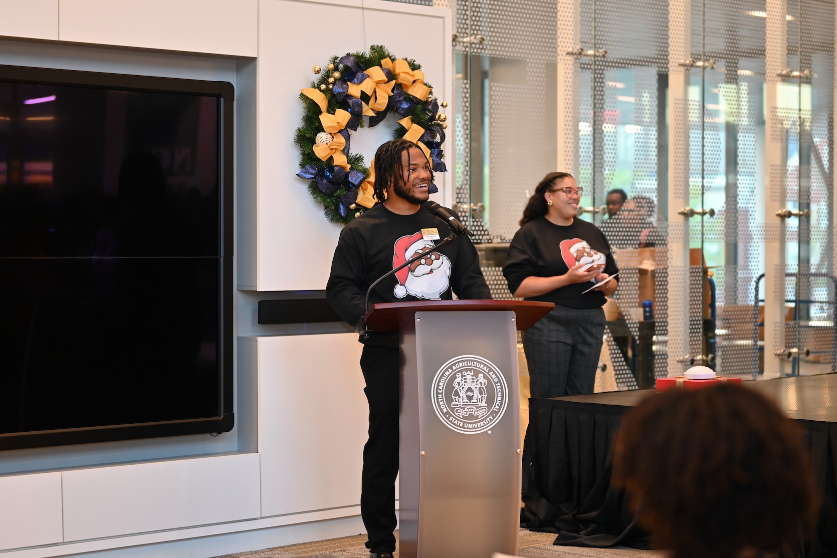 SUAB representative speaking at Holiday Tree lighting