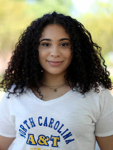 girl wearing A&T t-shirt