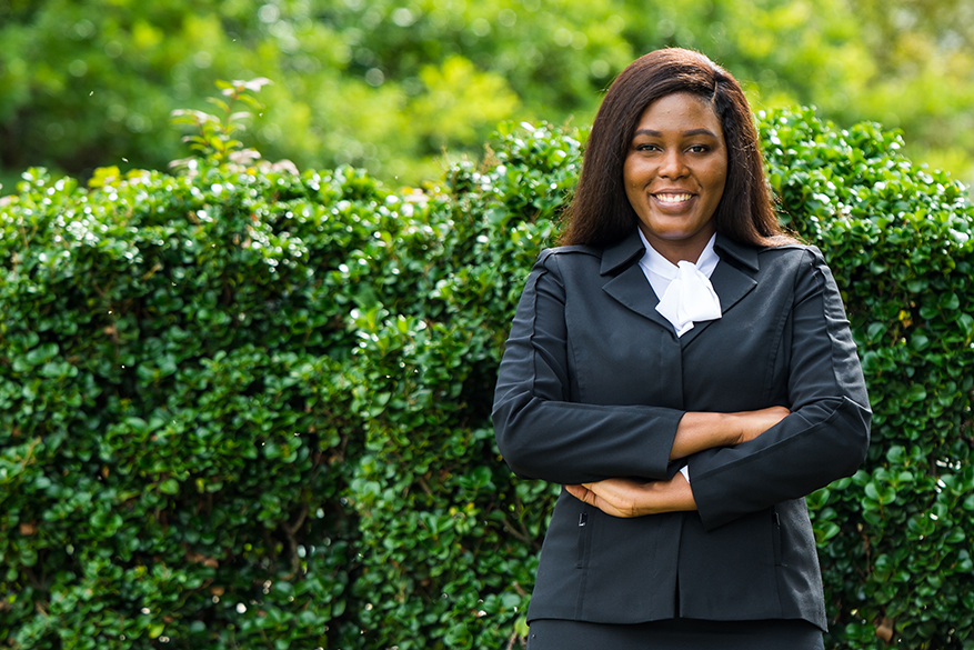 female student in a black suit