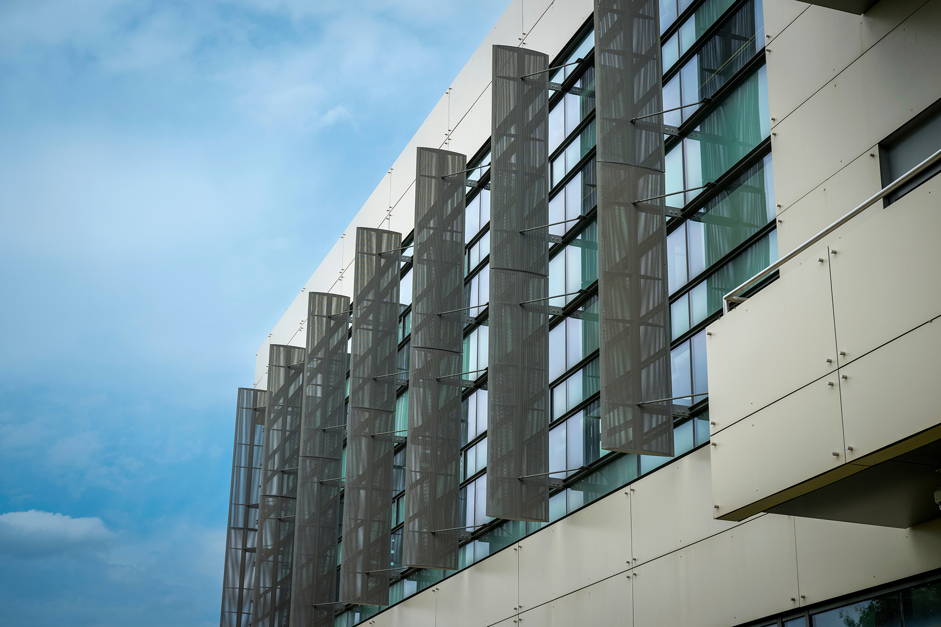 campus building exterior with metal grill design