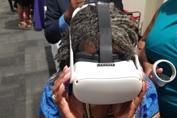 Attendee utilizing virtual reality 